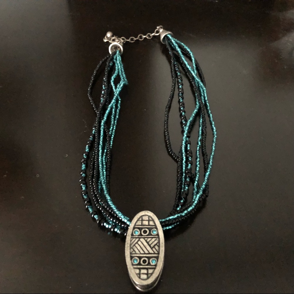 7 strand beaded necklace with charm